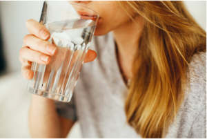 a lady drinking water